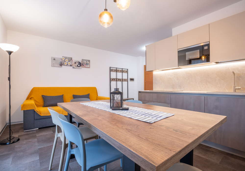 Residence Alessio | Appartamento al piano terra vicino alla piscina con giardino