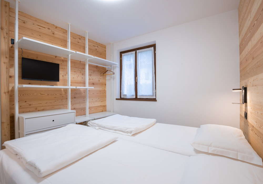 Residence Alessio | Appartamento al piano terra vicino alla piscina con giardino