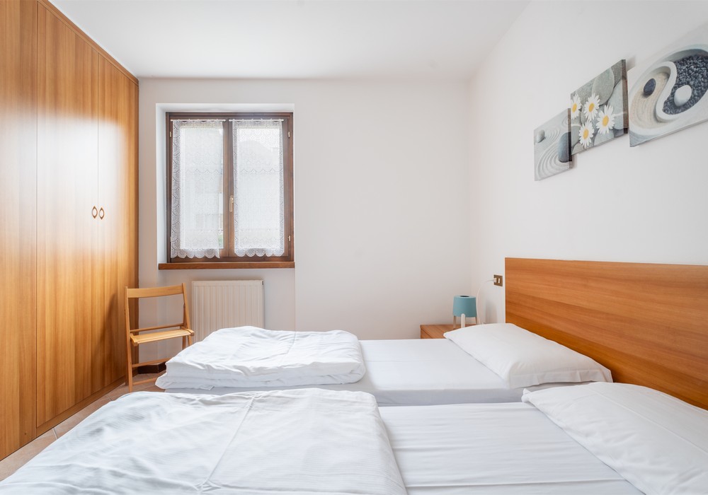 Residence Alessio | Appartamento al piano terra vicino alla piscina con giardino